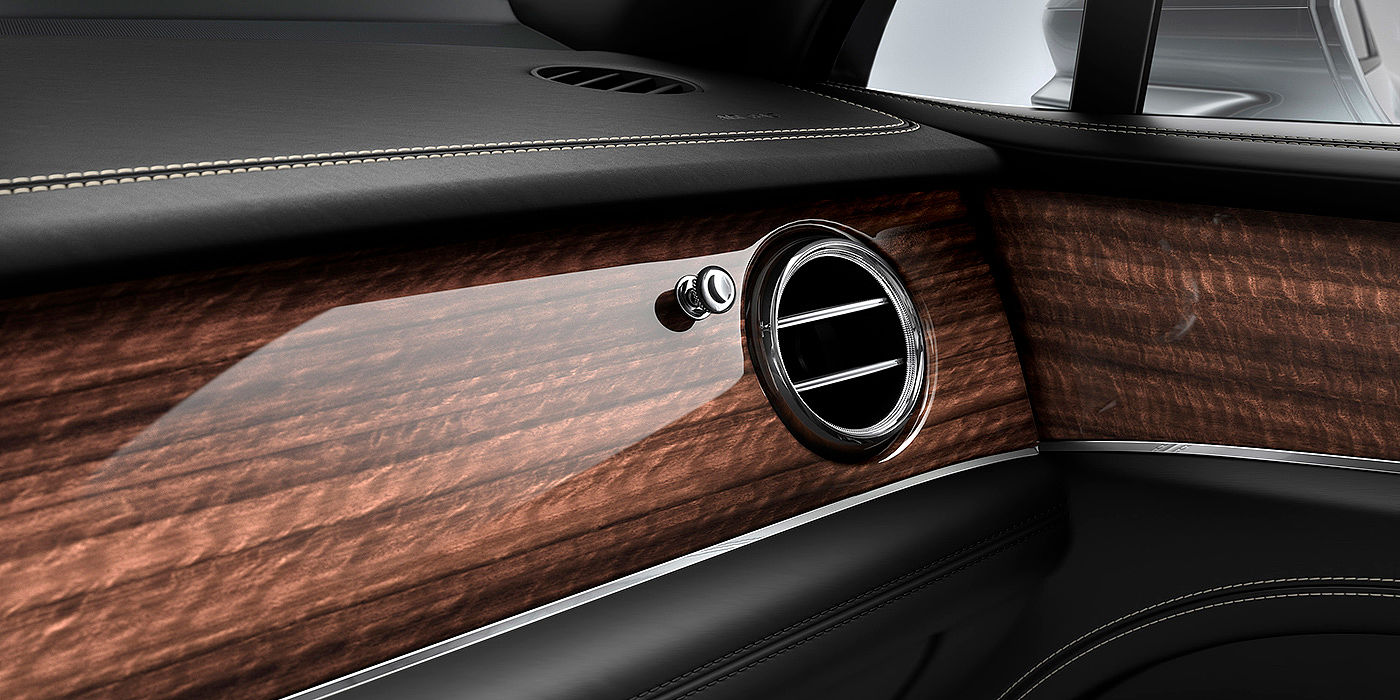 Bentley Chengdu - Jinniu Bentley Bentayga front interior Crown Cut Walnut veneer and chrome air vent.